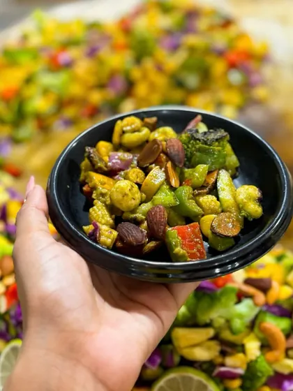 This is my English Vinglish Chaat, a healthy and vibrant mix of stir-fried vegetables like broccoli and baby corn, mixed with nuts and a zesty dressing. It's a guilt-free indulgence.