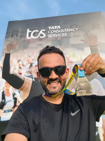 A proud GRR runner with his finisher medal from the TCS London Marathon. We compete on the world's biggest stages.