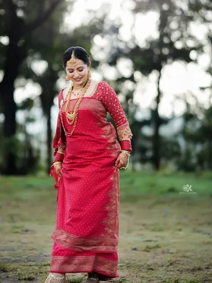 Iva looking graceful and elegant in her traditional red wedding saree. It was a pleasure to design this for her.