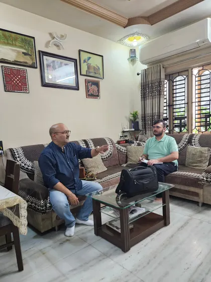 A consultation in progress. I often sit with clients in their space to help them understand the energy dynamics of their own home.