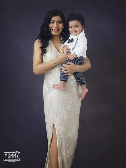 Classy with a side of sassy. A beautiful mother and son portrait from a formal studio session. The little boy in his bow tie is just too handsome!