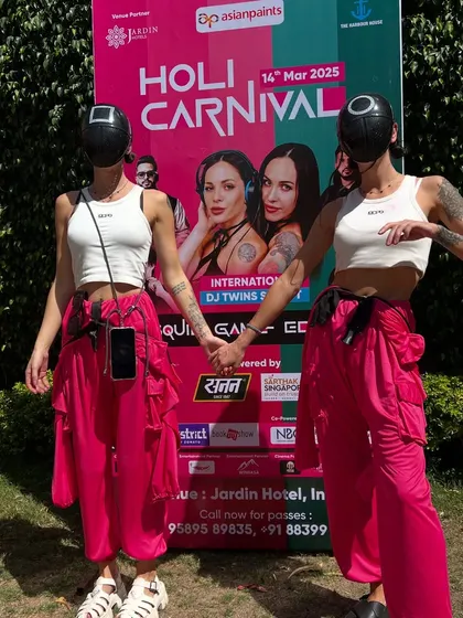Before the show at Holi Carnival in Indore. We love to bring a unique look to our shows, this time with our Squid Game inspired outfits.