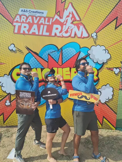 More fun poses from our runners at the Aravali Trail Run, showing off their finisher medals and props.