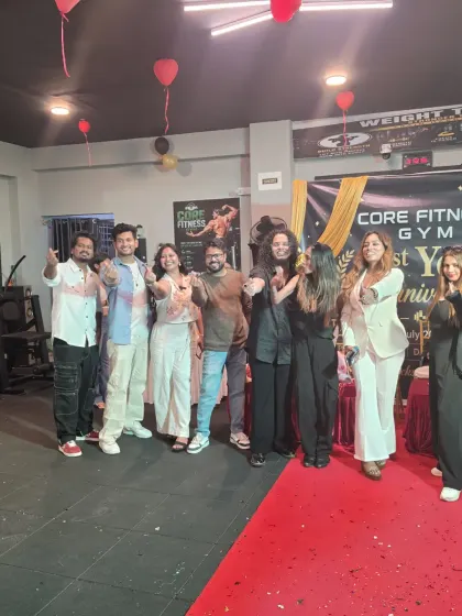 A group photo with the enthusiastic team and guests at the Core Fitness anniversary. A successful event ends with happy faces and a great sense of community.