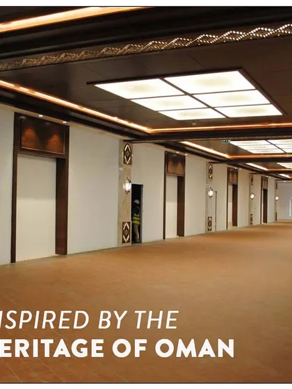 This image from the award-winning Souq al Madina highlights the intricate heritage details in the ceiling and wall panels, inspired by the rich culture of Oman.