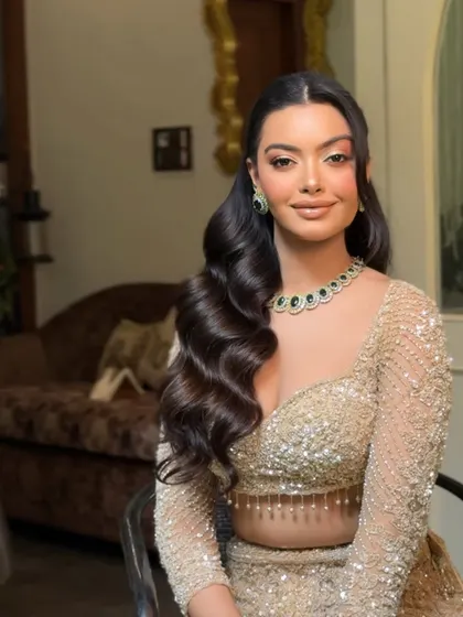 Another look at the deep, structured waves. This is a versatile style that works for brides, bridesmaids, or guests who want a touch of old school glamour.