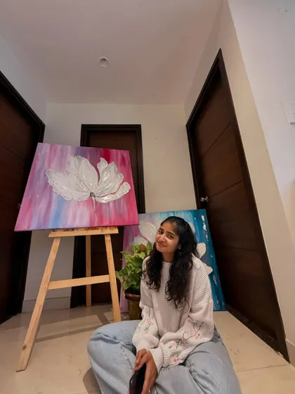 This is the fifth painting of my six-part series, "The Becoming." Pictured here with another piece from the collection, you can see how the theme of blossoming evolves through different color palettes and emotions.