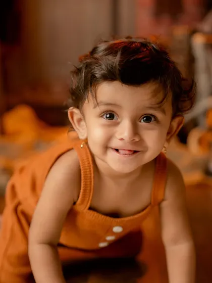 A beautiful, bright smile captured during a rustic-themed shoot. Sometimes the simplest moments are the most precious.