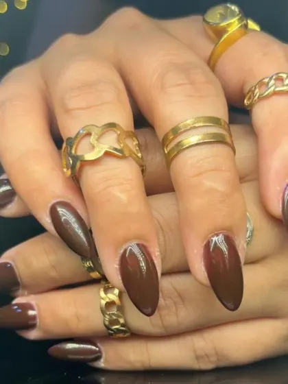 Another angle of the sophisticated dark brown nails.