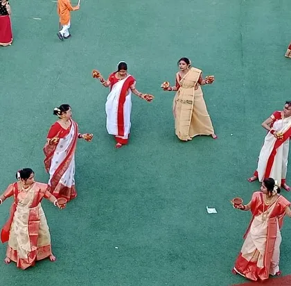 The synchronized movements of the dancers create a beautiful spectacle on our school grounds.