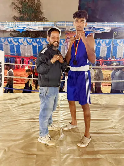 Standing with one of my dedicated boxers inside the ring after a hard fought bout at the Republic Day Karnataka State Boxing Championship. You either win or you learn.