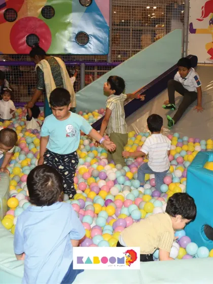 A wide view of the ball pit area, always bustling with happy kids and watchful parents.