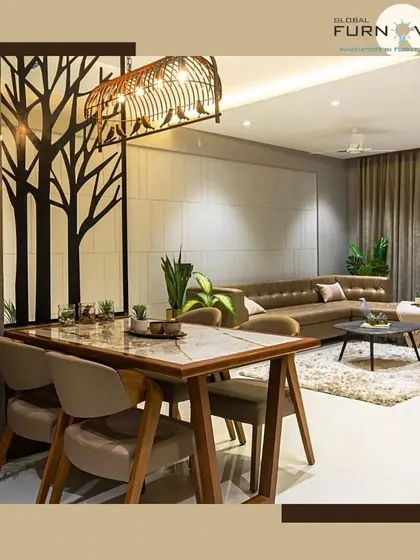 A contemporary living and dining area with a unique tree-motif partition that adds an artistic touch. The space combines a marble-top dining table with a comfortable leather sofa for a cohesive look.