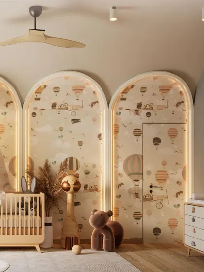 A hidden door to the walk-in closet is seamlessly integrated into the arched wallpaper panels, maintaining the room's magical and cohesive design.