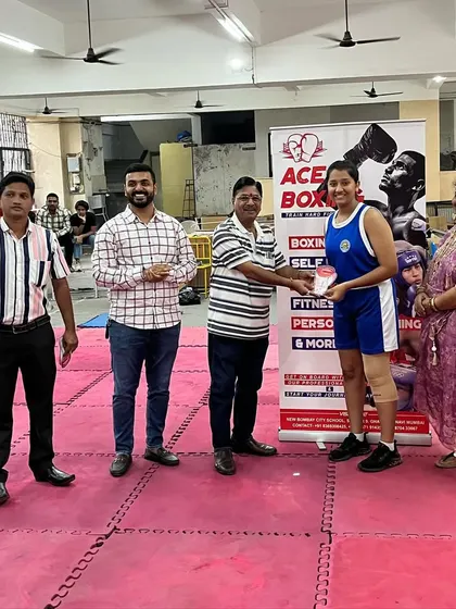 Our National Gold Medalist Prisha Pawar being awarded 'Best Boxer' at the 87th ICCBS event hosted by our academy. Her skill and sportsmanship stood out among many talented fighters.