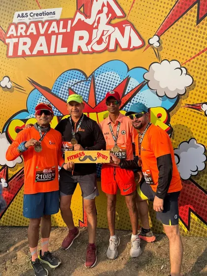 Four of our male runners with their medals after the Aravali Trail Run. A job well done.