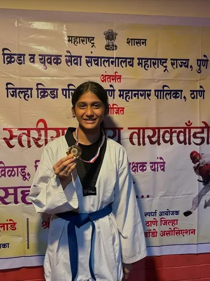 My student Kinjal Shirke with her hard earned medal. Her focus during Poomsae and Kyurogi practice sessions paid off beautifully in this tournament.