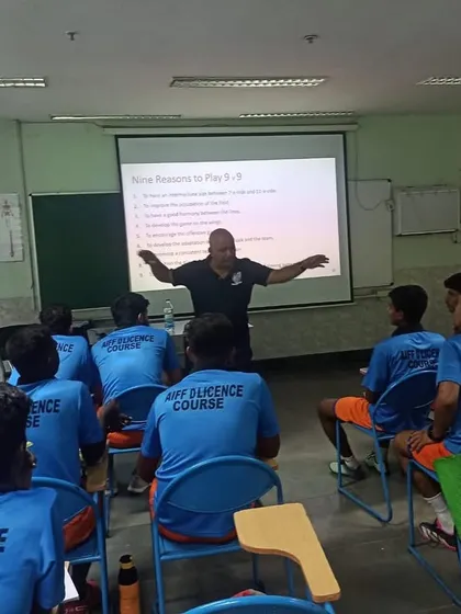A classroom session for our coaches during their AIFF D License course. The theoretical side of the game is just as important as the practical.