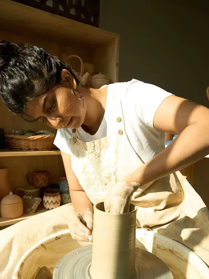 Here I am at my wheel, where most of my ideas take shape. This studio is my creative space, and every piece that comes out of it has been shaped by my own two hands.