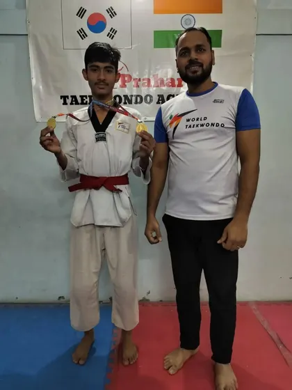 This red belt student won two gold medals at the district championship.