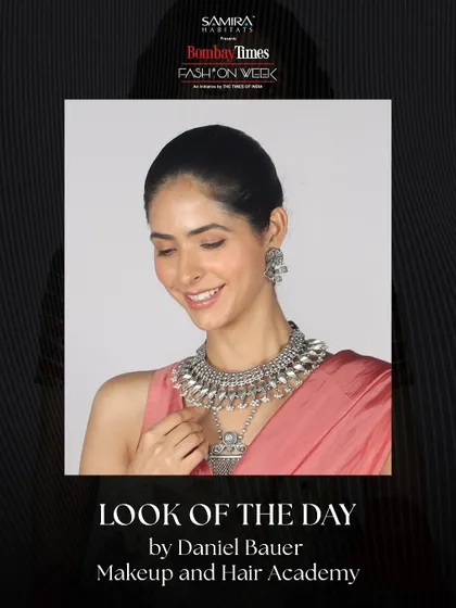 Presenting the official "Look of the Day" from Bombay Times Fashion Week, created by our academy. This look features a radiant smile, elegant silver jewelry, and a clean, polished makeup finish.