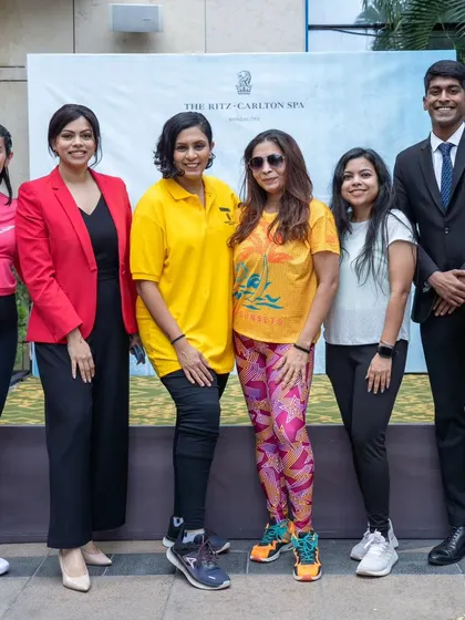 Posing with some of the key people behind a corporate wellness event. Collaboration is key to creating a successful program.
