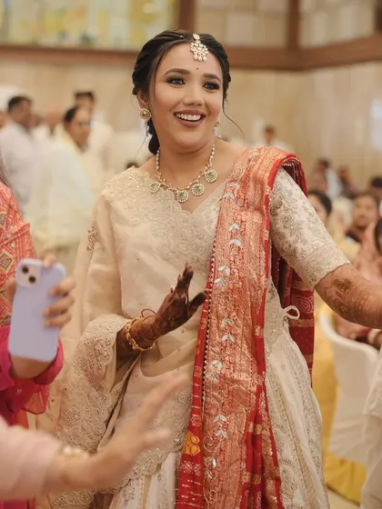 A candid moment of the bride dancing and enjoying her ceremony.