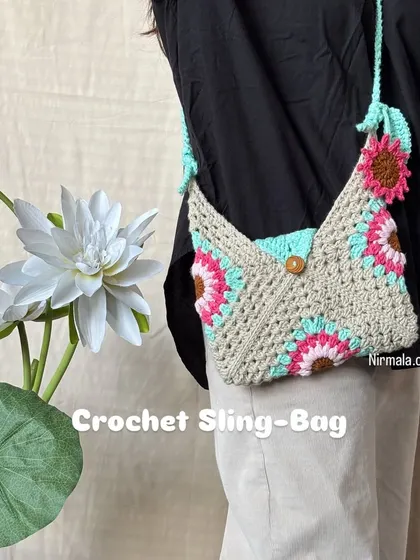 We designed this unique pastel sling bag for those who love a touch of vintage charm. The envelope-like shape is a fun twist on a classic, and the floral granny squares add a soft, delicate feel.