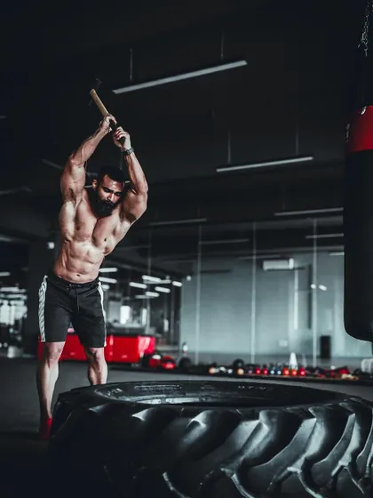 The sledgehammer and tire workout is a powerful tool for developing explosive power, core strength, and cardiovascular endurance. It's a full body challenge.
