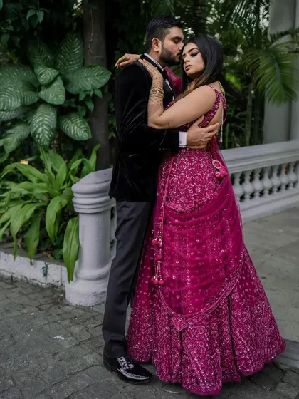 A stunning reception look at the Taj Westend. We use dramatic lighting and elegant backdrops to create sophisticated and timeless portraits for your evening events.