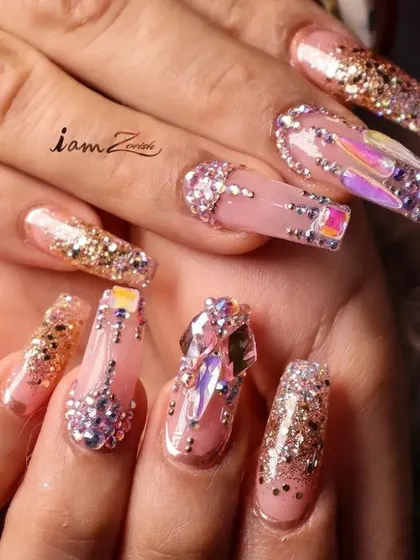 A detailed close-up of a custom jeweled manicure. Notice the clarity of the crystals and the smooth application of the glitter, showcasing the high-quality materials and attention to detail I put into every set.