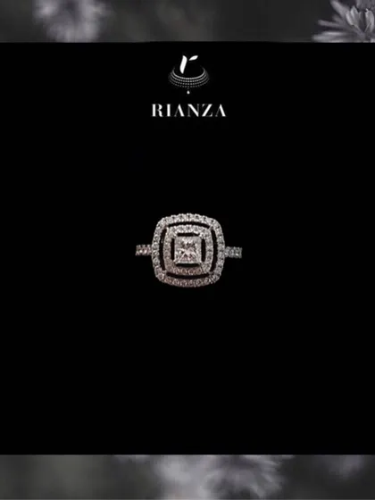 For those who prefer a more modern aesthetic, this ring features a princess-cut diamond in a double square halo setting. The geometric lines give it a chic and contemporary feel.
