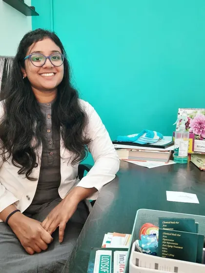 A moment at my desk in the clinic. I am here to listen to your concerns and create a personalized, effective treatment plan for your skin and hair health.