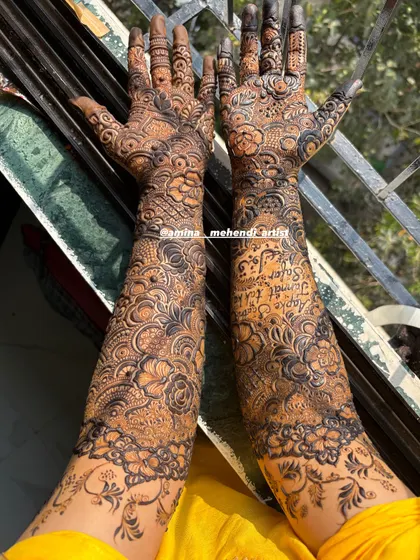 A full view of the design with the tribute to the bride's parents, showing how it's beautifully placed on the arms.