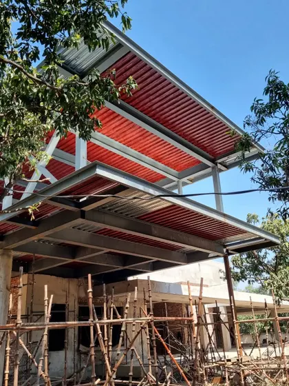 Another work-in-progress shot of Residence S, showing the layered steel roof structure. This design creates deep verandahs and covered pavilions that are in constant conversation with the surrounding landscape and trees.