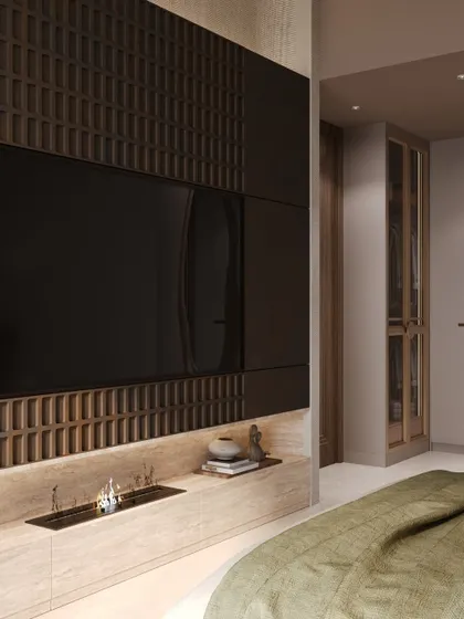 Another angle of the media wall, revealing the entrance to the walk-in closet. The entire room is a masterclass in layering textures and materials.