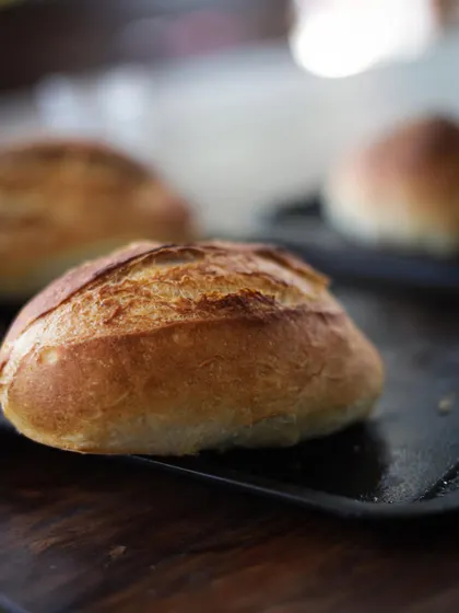 Freshly baked bread, straight from the oven. Our pre-professional program includes a module on baking fundamentals.