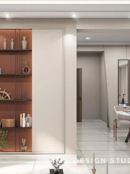 A living room concept for a project in Ghaziabad, showcasing a built-in shelving unit with a rust-colored backing, providing a beautiful display area that is both functional and artistic.
