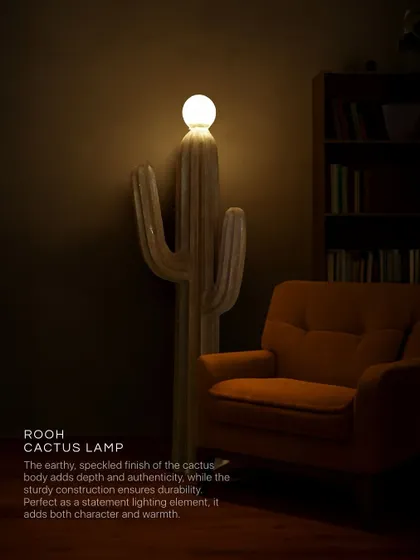 Our Rooh Cactus Lamp balances a sharp, sculptural form with a soft, inviting glow. The earthy, speckled finish of the concrete body adds depth and authenticity, making it a statement lighting element that brings both character and warmth to any corner, day or night.