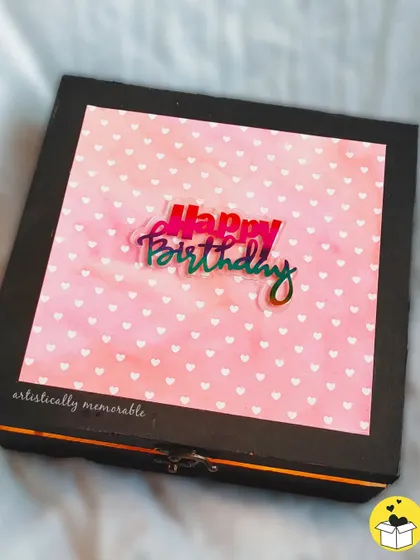 A pretty pink and black hamper box for her birthday. The holographic "Happy Birthday" on the lid adds a fun, modern touch.