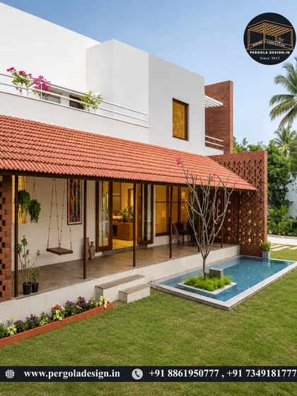 A beautiful backyard view of a home with a tiled roof patio. The space includes a swing and a small water feature, creating a serene and picturesque setting for outdoor living.