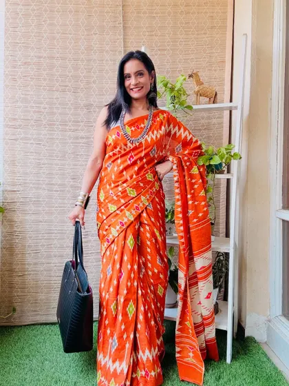 This pre-stitched cotton saree in a vibrant orange ikat print is perfect for when you're in a hurry. It's a stylish and convenient option from Amazon for under 900.