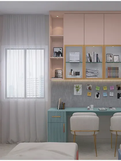 A beautiful study unit for a shared kids' room, featuring a dusty pink and mint green color palette with gold hardware. The design includes plenty of overhead storage and display shelves.