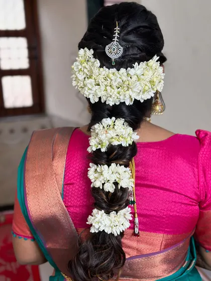 Braid inspiration. A classic, thick South Indian style braid adorned with fresh jasmine flowers (gajra).