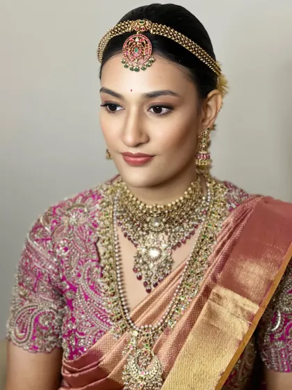 A beautiful profile shot that showcases the flawless base and the way the makeup enhances the bride's features. You'll learn how to create a look that is perfect from every angle.