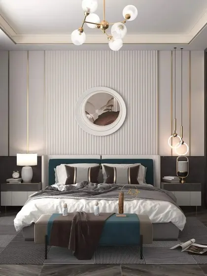 This bedroom combines a fluted white wall with dark panels and gold accents for a chic, high-contrast look. The hanging pendant lights add a modern touch to the bedside.
