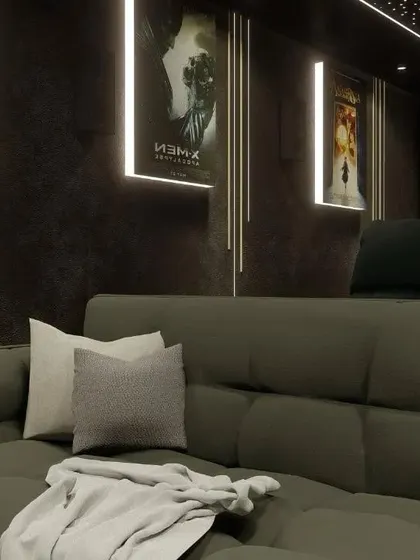 A cozy corner with a plush sofa, perfect for relaxing even when a movie isn't playing. This shows the versatility of the space.