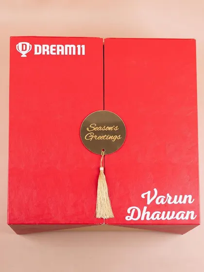 Another personalized box from the Dream11 order, this one for Varun Dhawan. The gold tassel and custom name printing add a touch of personalized luxury.