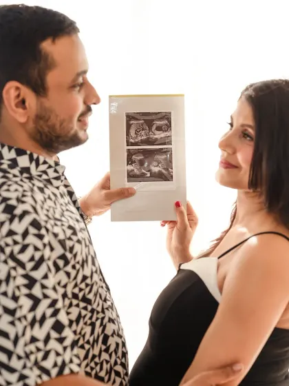 A close-up on the ultrasound photo. This shot focuses on the couple's reaction to seeing their baby's first pictures, a truly special moment.