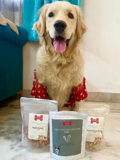 Look at this happy golden retriever with his haul of Barkery treats! Seeing my customers this excited makes all the hard work worth it. His owner loves that my treats are made with all-natural, human-grade ingredients.